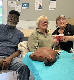 Activity group gathers for coffee